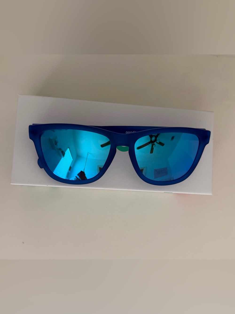 Goodr Womens Falkor's Fever Dream blue mirrored sunglasses